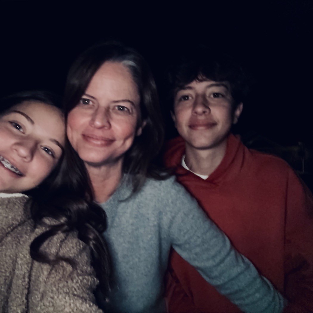 Valerie with her two kids on a night out